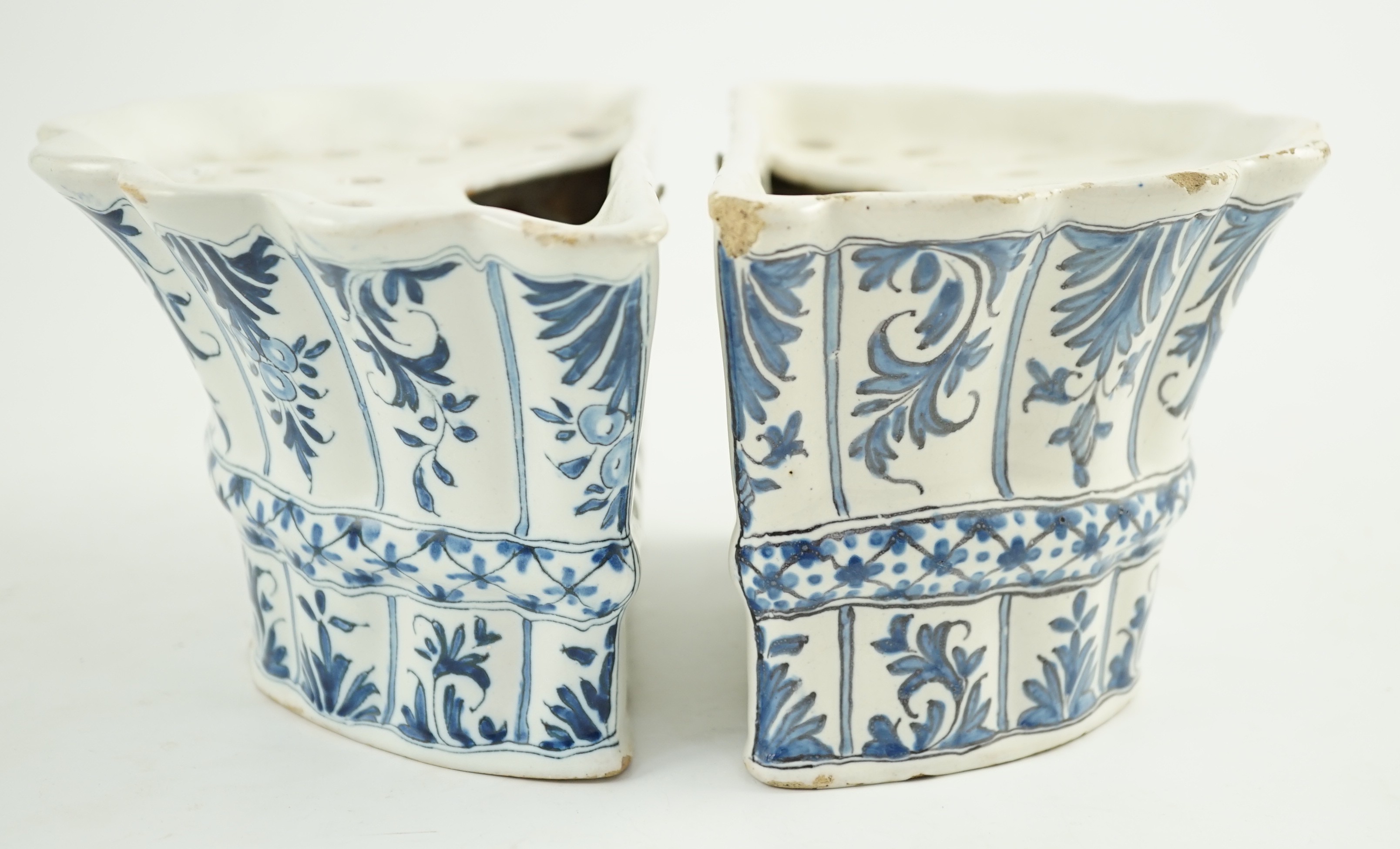 Two similar 18th century Delft blue and white hanging bough pots, 18.3cm wide